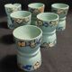Antique painted wooden egg cups, set of six from the 1930s.
