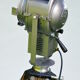 Cremer cinema projector on wooden tripod