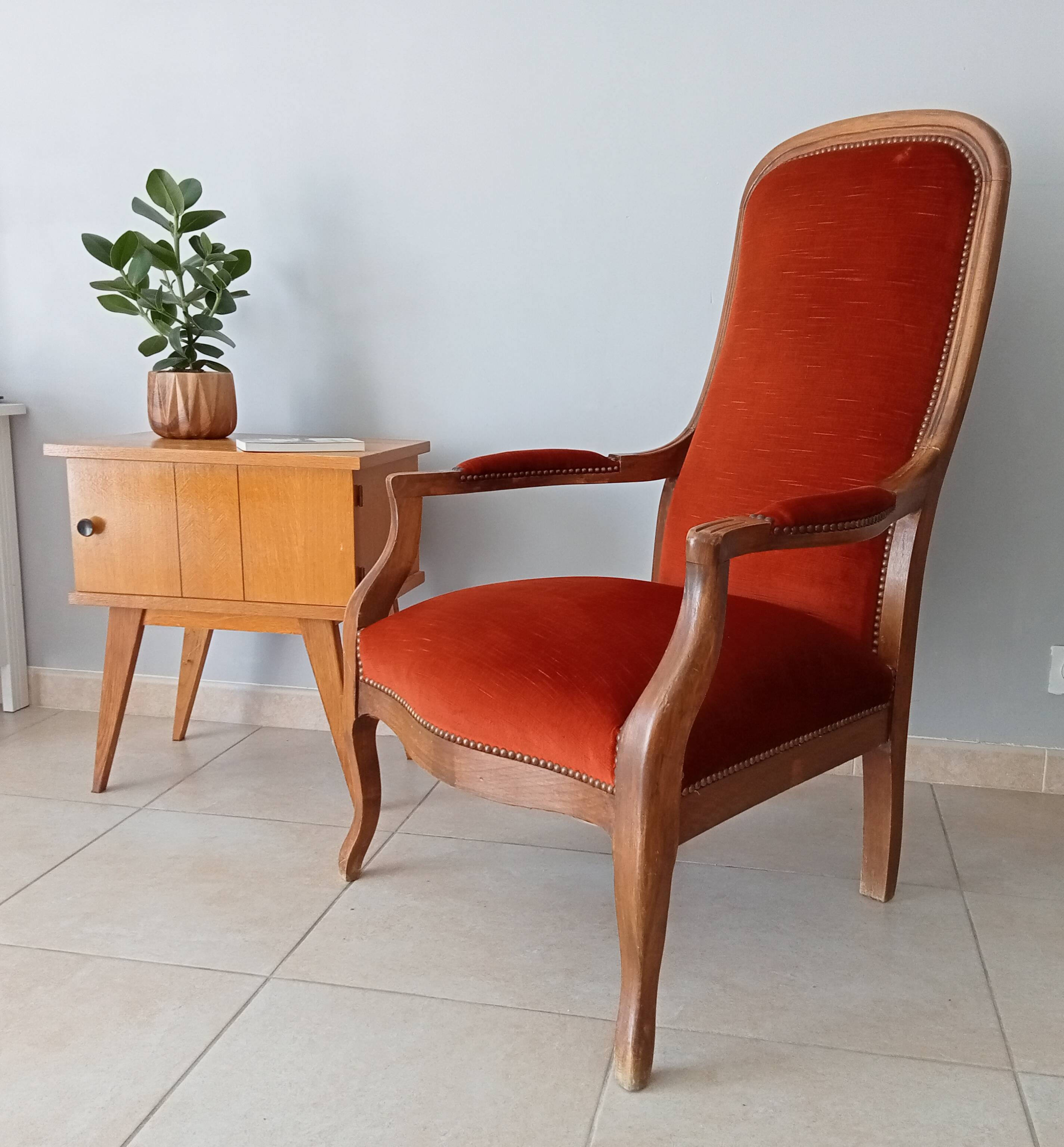 Walnut and velvet voltaire armchair