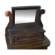 Rustic brown pine mirror, 1920s German style with decorative drawer casing.