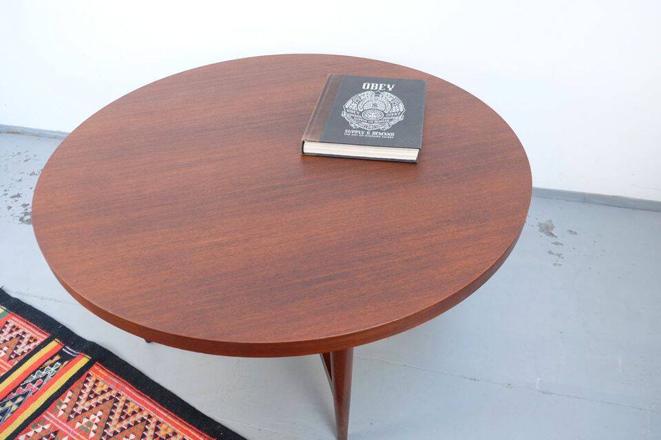 Vintage teak coffee table in 60s-70s style, retro style.