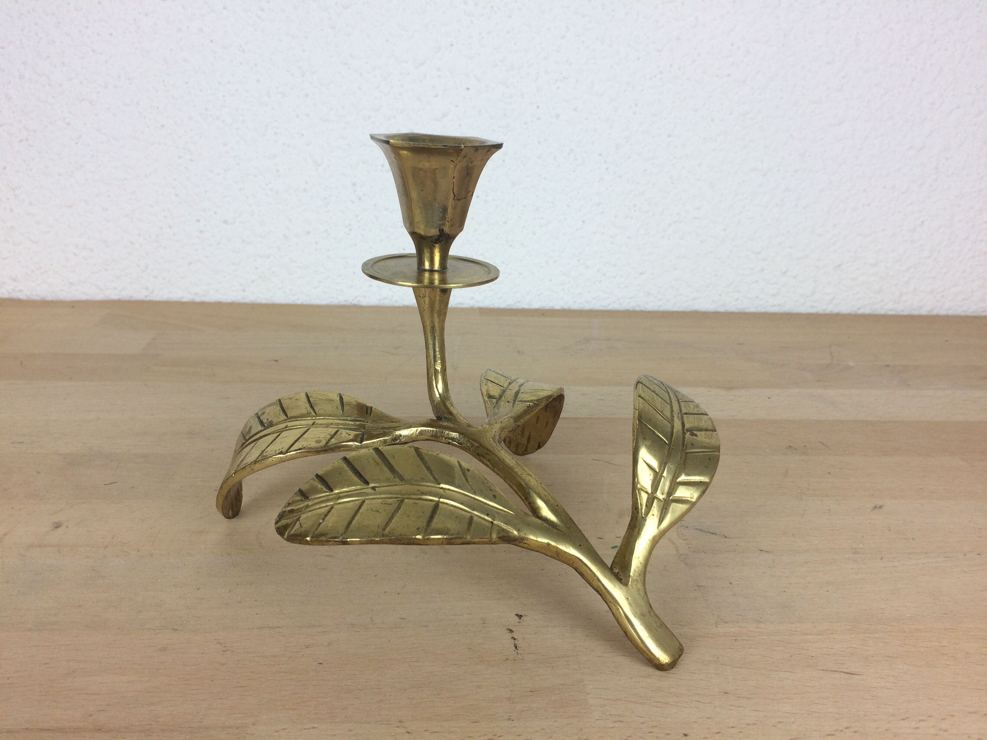 Candle holder flower leaves in golden brass