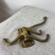Three-pronged folding brass coat hook