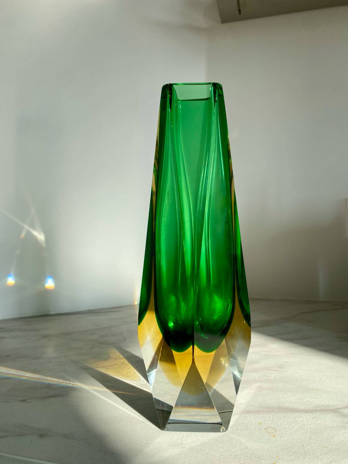 Submerged vase Mandruzzato Murano green and amber, sculpted faceted glass