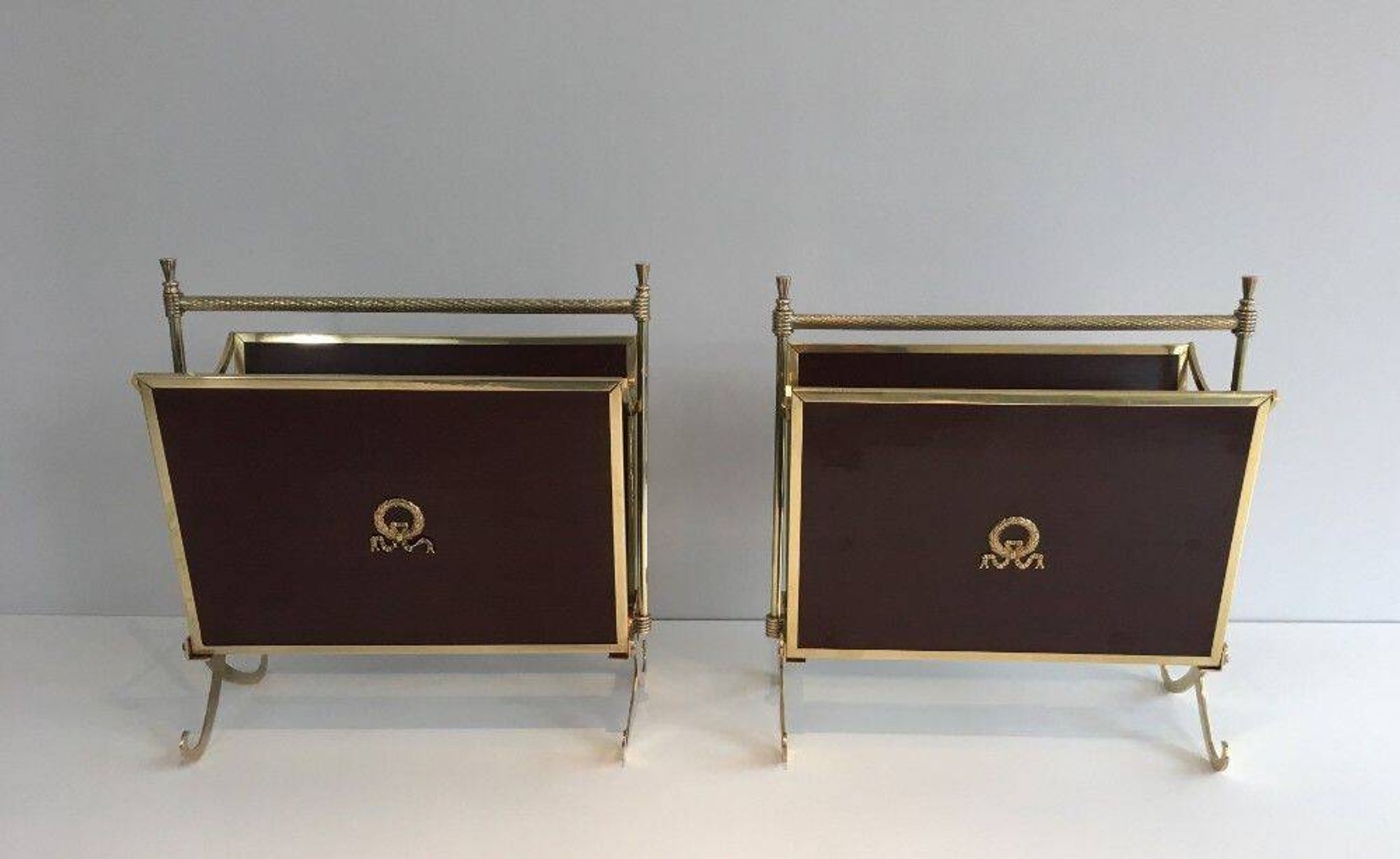 Pair of mahogany and brass magazine racks. Maison Jansen