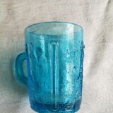 Old turquoise glass cup