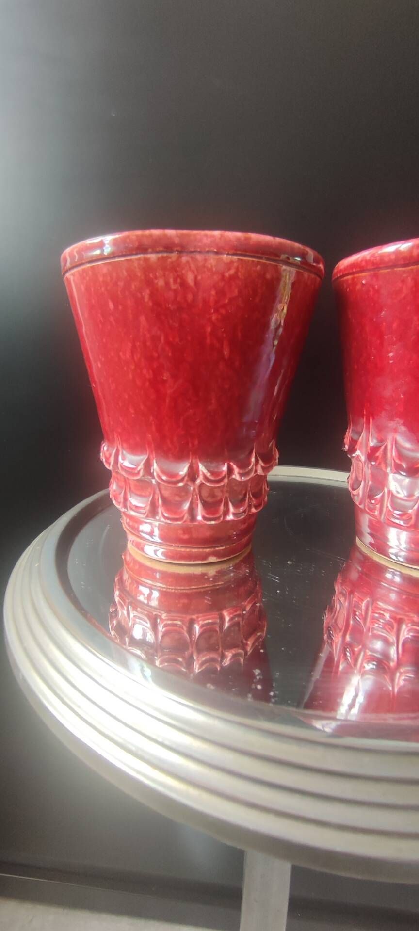 Pair of Art Deco asymmetrical red oxblood ceramic vases