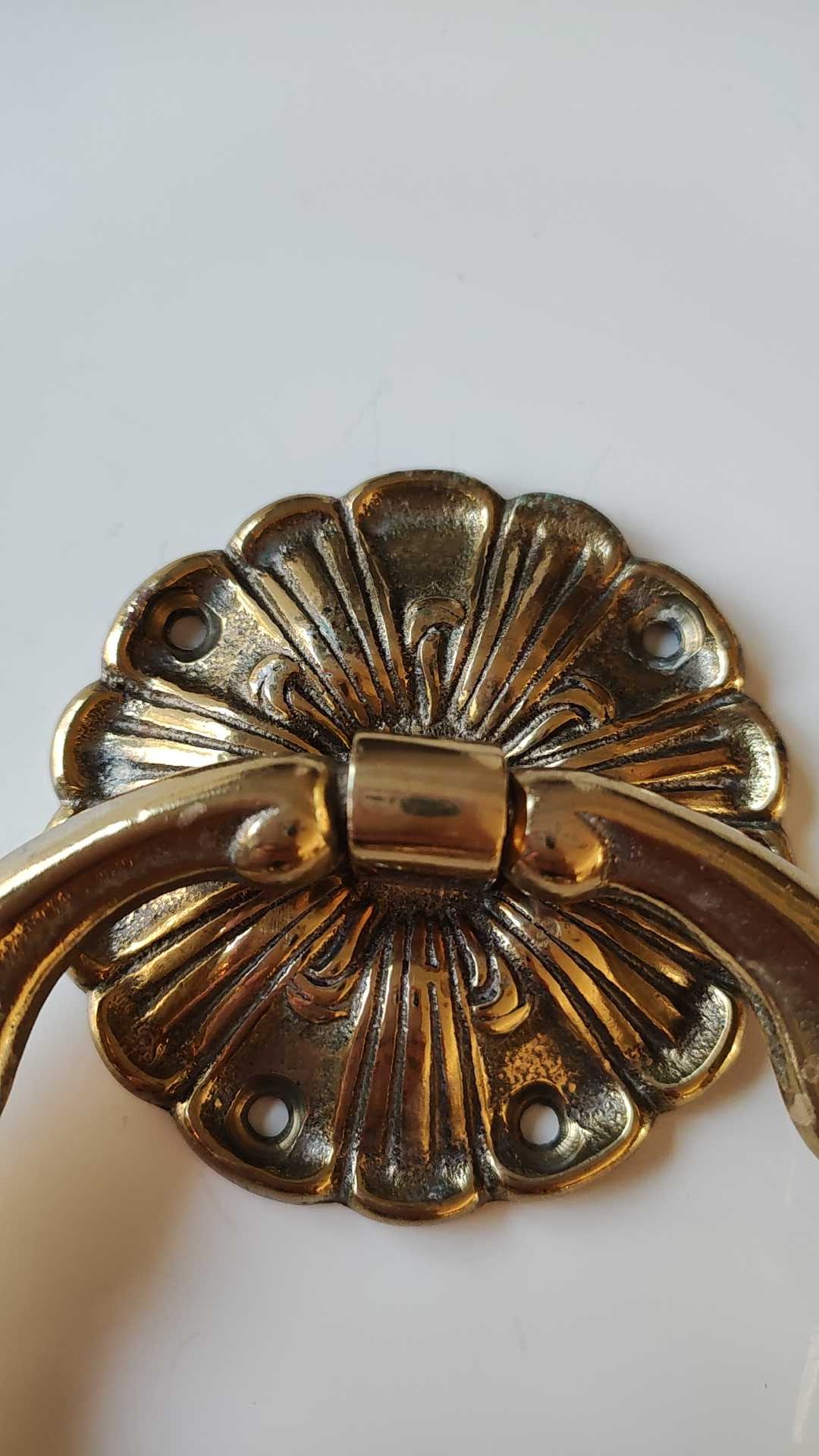 Antique door knocker/hammer of floral shape with large ring decorated with scrolls of acanthus