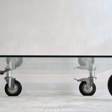 Beautiful designer glass coffee table on wheels