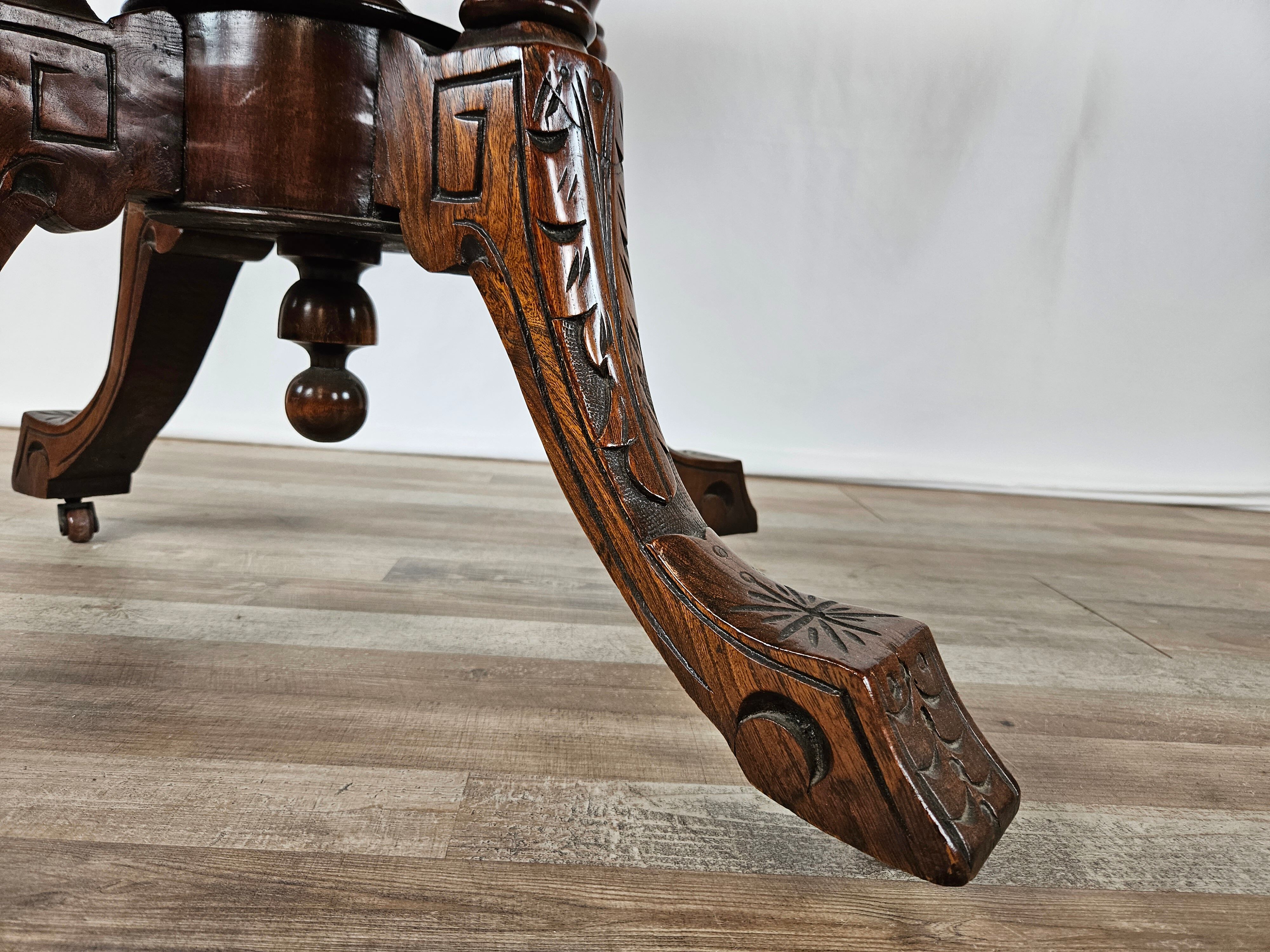 Coffee table in walnut with maple inlays and wheels