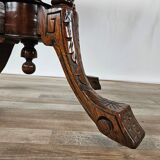 Coffee table in walnut with maple inlays and wheels