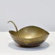 Empty brass leaf pocket