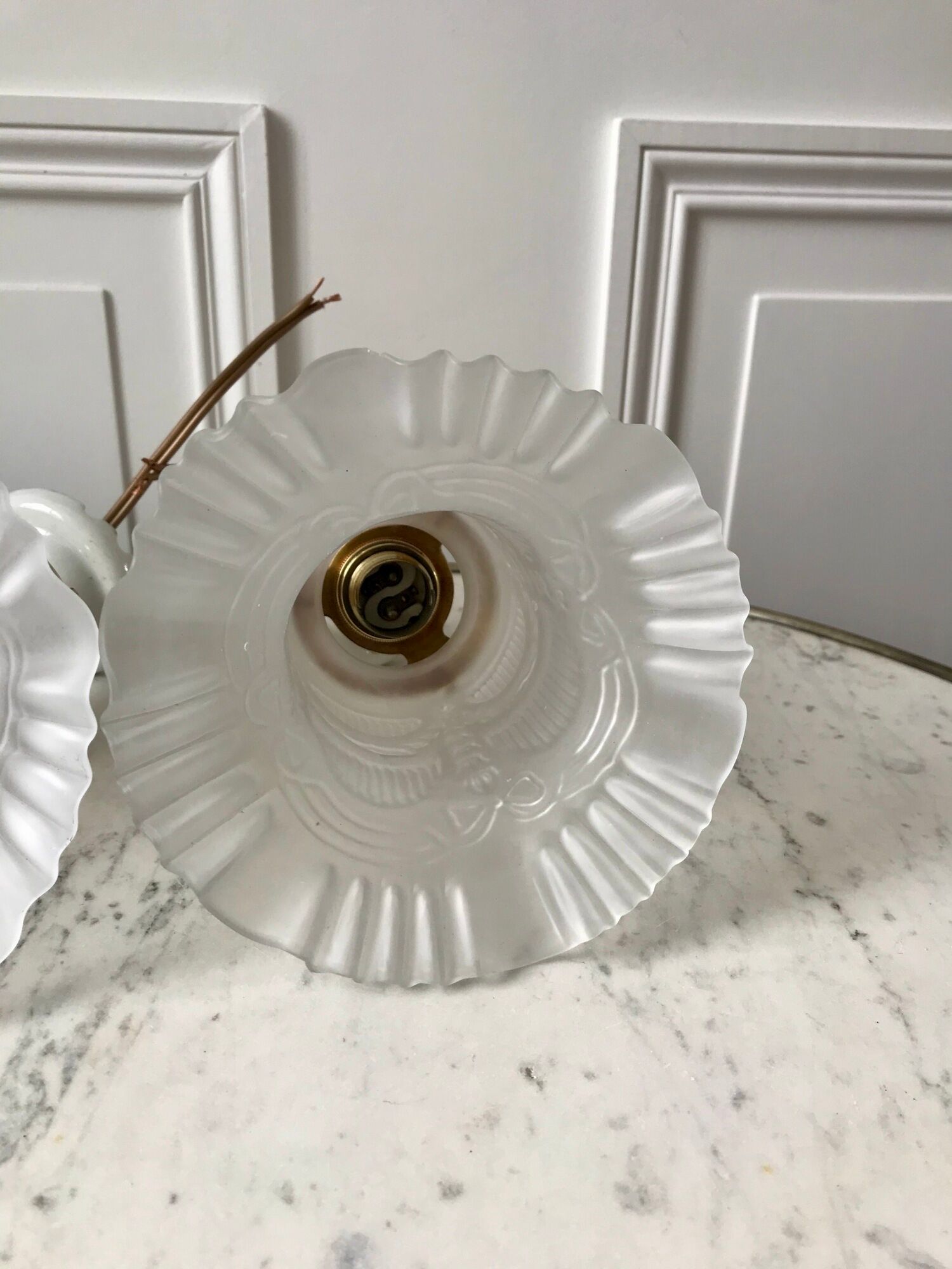 Pair of tulip wall lamps in molded glass on porcelain support 20s