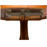 Baumann style wooden table with extensions.
