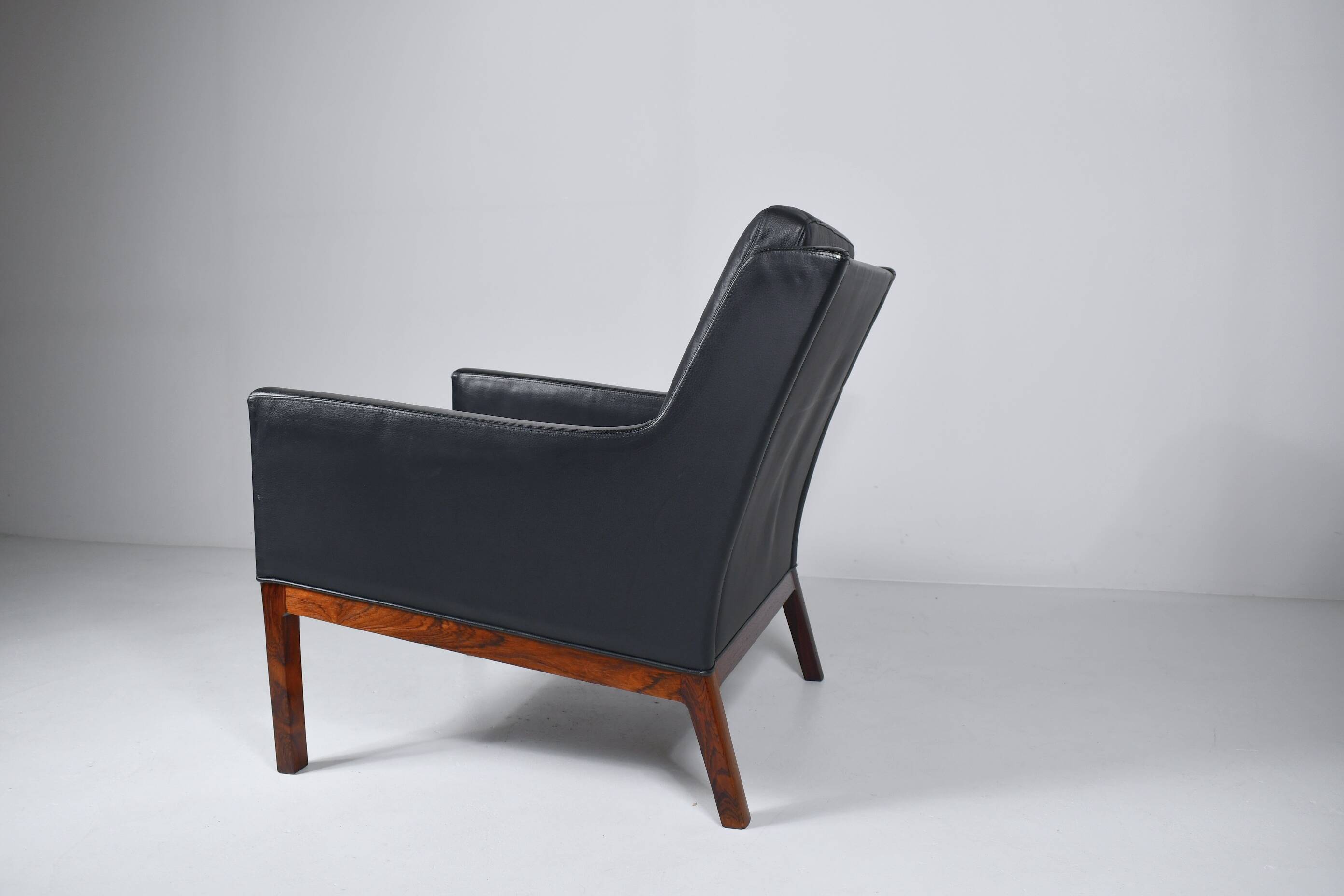 Leather and rosewood armchair by Kai lyngfeldt-Larsen. Denmark