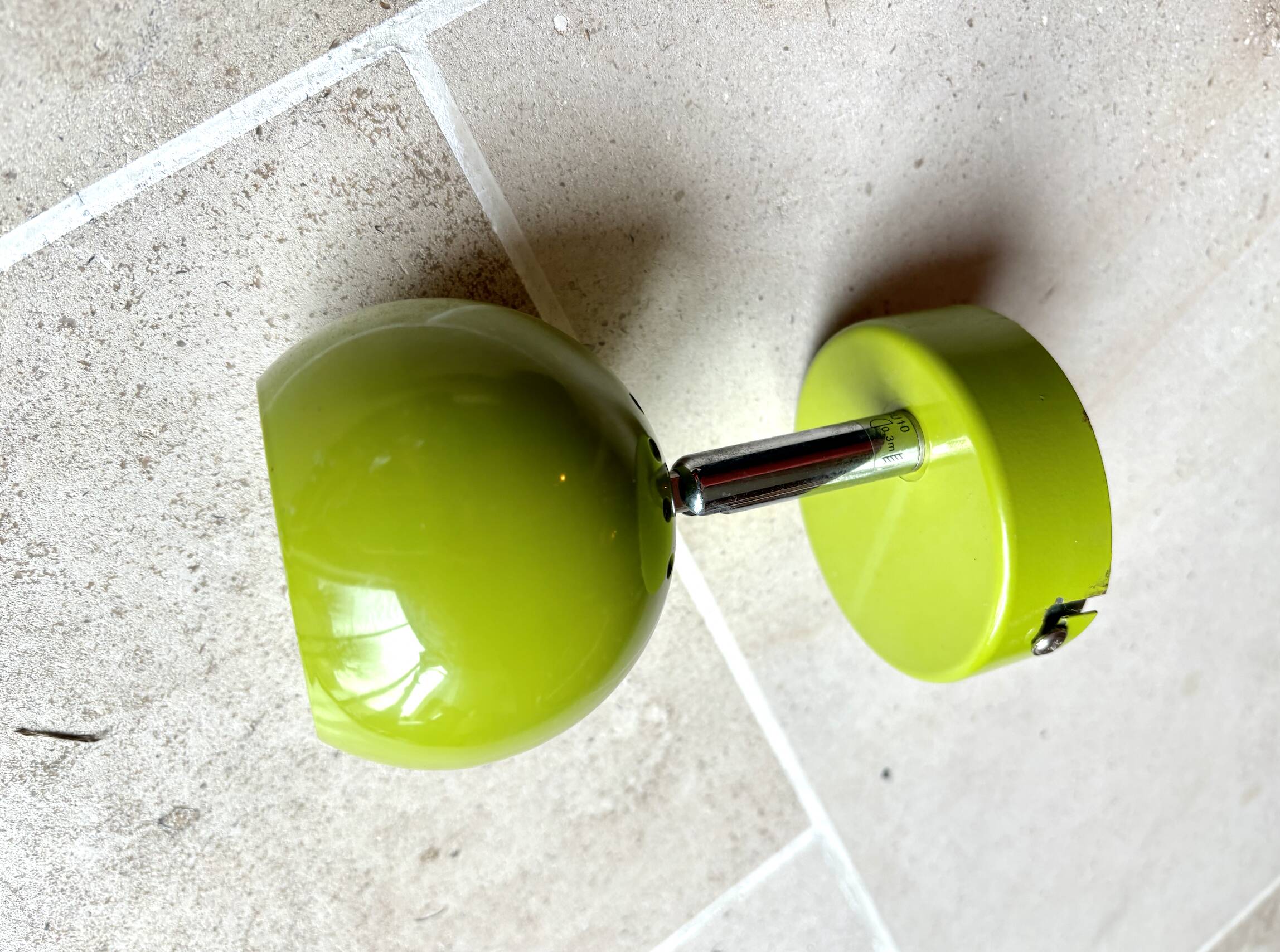 Small vintage metal spotlight in anis green/khaki color.