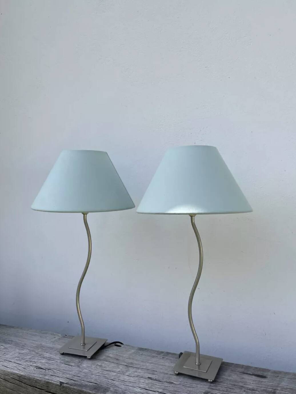 Pair of lamps with wavy metal base and blue lampshade 2000