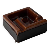 Geometric brown enamelled ashtray with a leather base (1960s-70s)