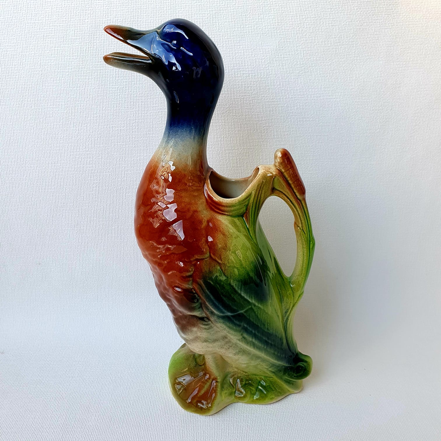 Pichet canard barbotine en faïence de saint clément,