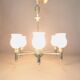 Maison Lunel 1960 6-light chandelier in gilded brass and green lacquered.