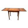 Old table with integrated extensions