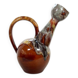 Large bird jug with high neck and handle, signed under the base