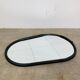 Oval mirror from the 1950s, wrought iron and brass.