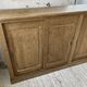 Large row of solid oak loom sliding doors