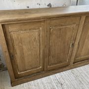 Large row of solid oak loom sliding doors