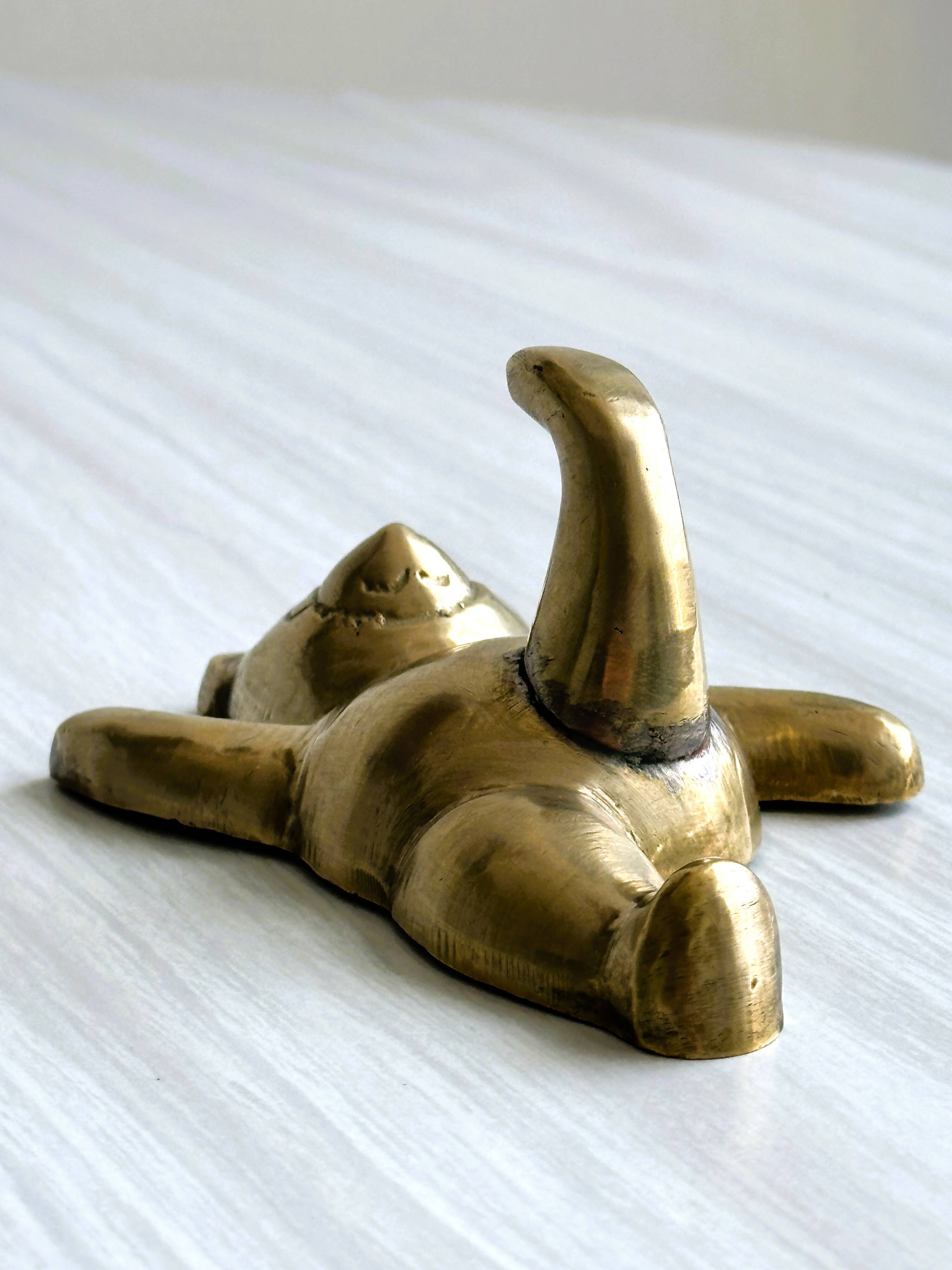 Towel rack - metal bear coat rack.