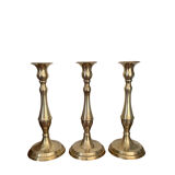 Set of three vintage brass candlesticks
