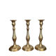 Set of three vintage brass candlesticks