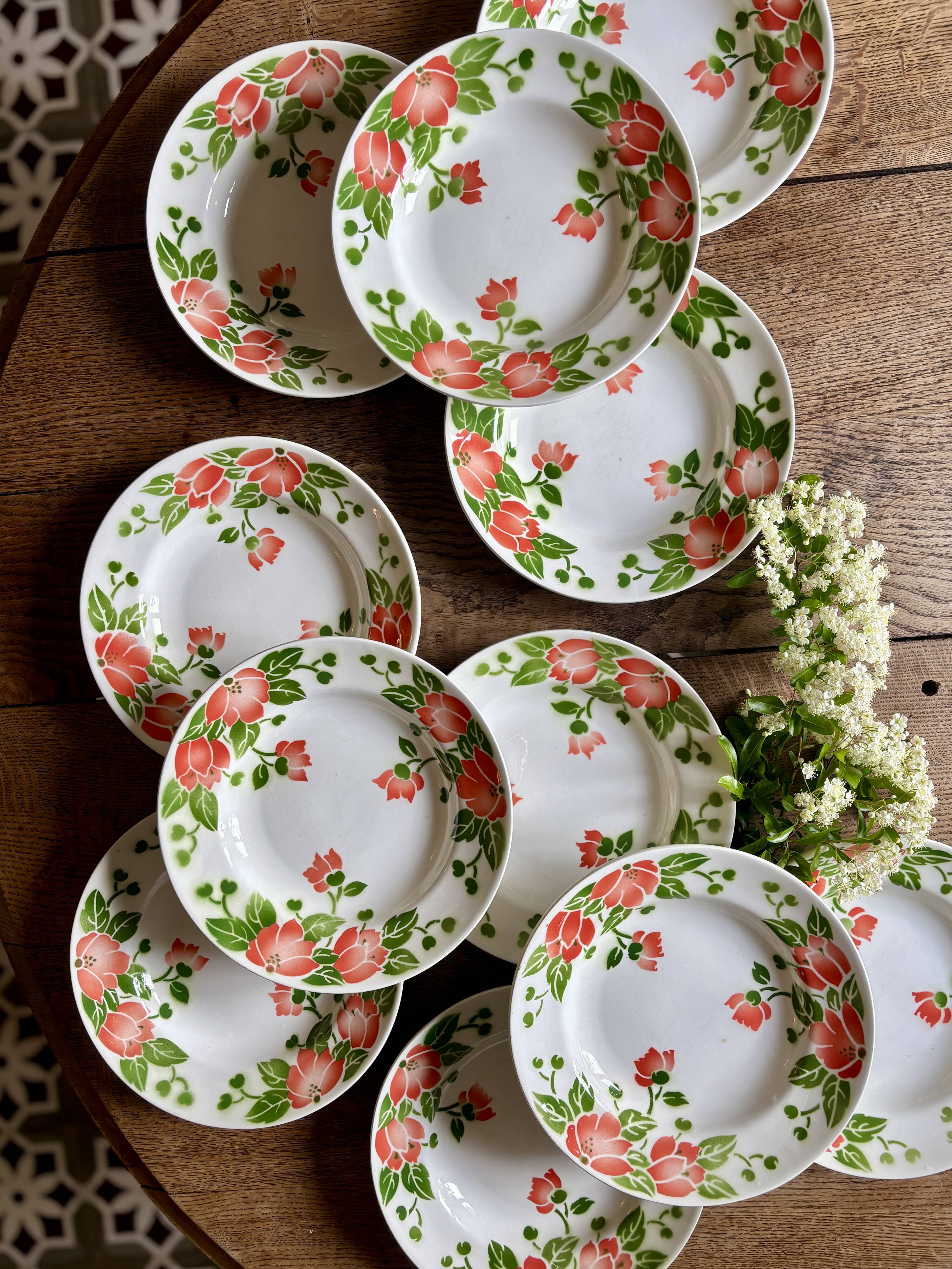 Set of 11 vintage deep plates by Eric de Moulin des Loups.