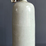 Bouteille en grès moucheté