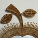 Rattan mirror in the shape of an apple from the 1960s Italy.