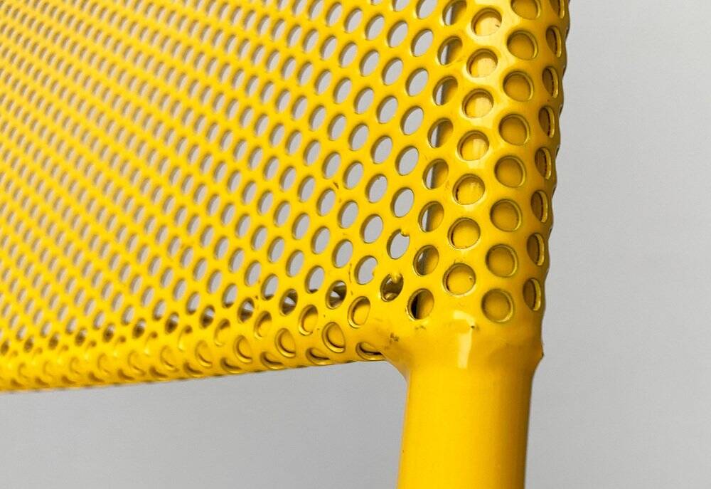 Italian perforated metal chair from the mid-century space age, 1960s.