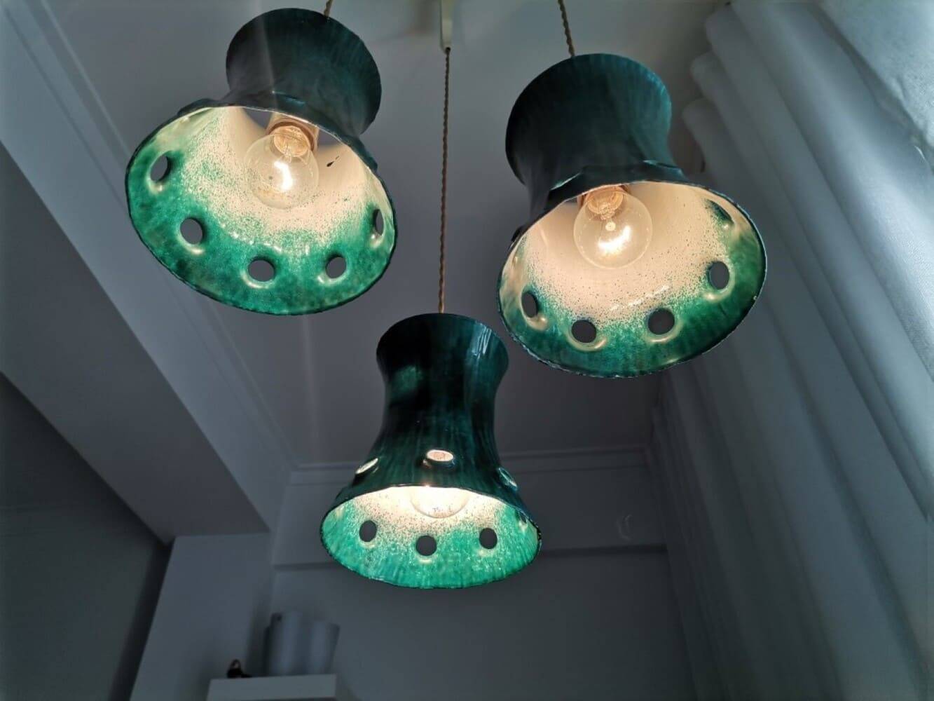 Green cast iron cascading chandelier