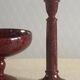 Candlesticks and bowl in speckled ceramic.