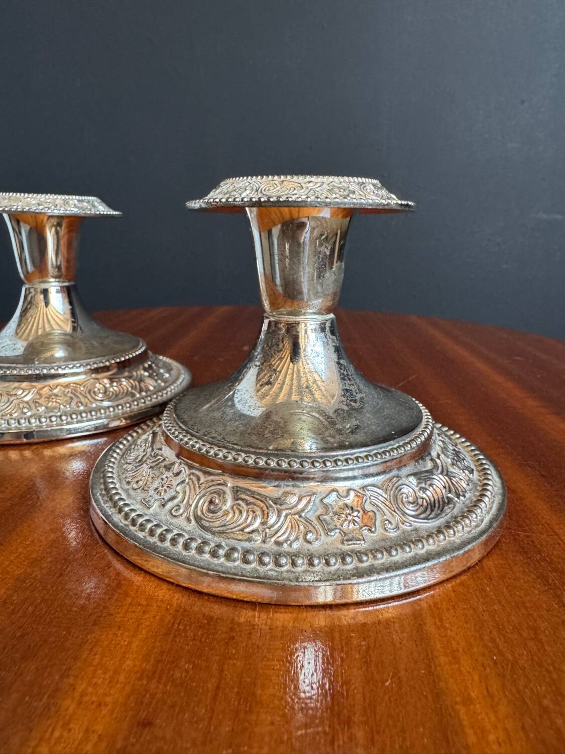 Silver-plated metal candlesticks from the 1980s.