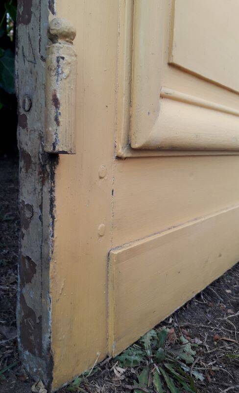 19th century double arched entrance door in oak with grilles and old glass