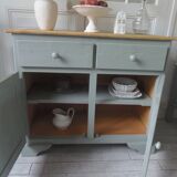 Compact buffet re-enchanted in grey-green, wooden top.