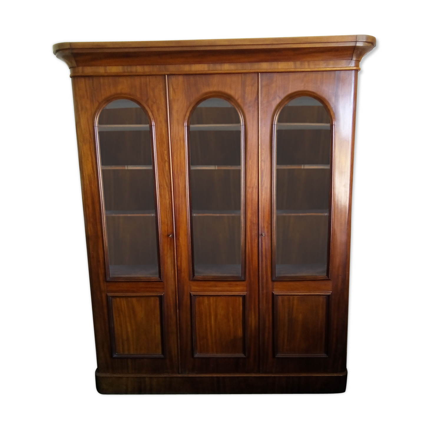 Mahogany bookcase glazed glass warhead windows