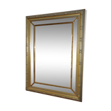 Large mirror with gilded and carved wooden glazing beads