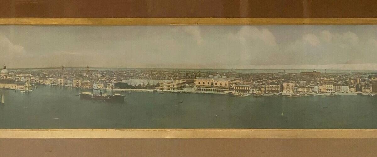 Panoramic view of Venice in a 20th century carved walnut frame