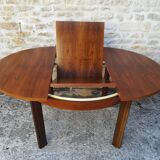 Round table with an extension