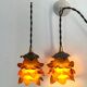 Pair of glass roses as coat hooks.