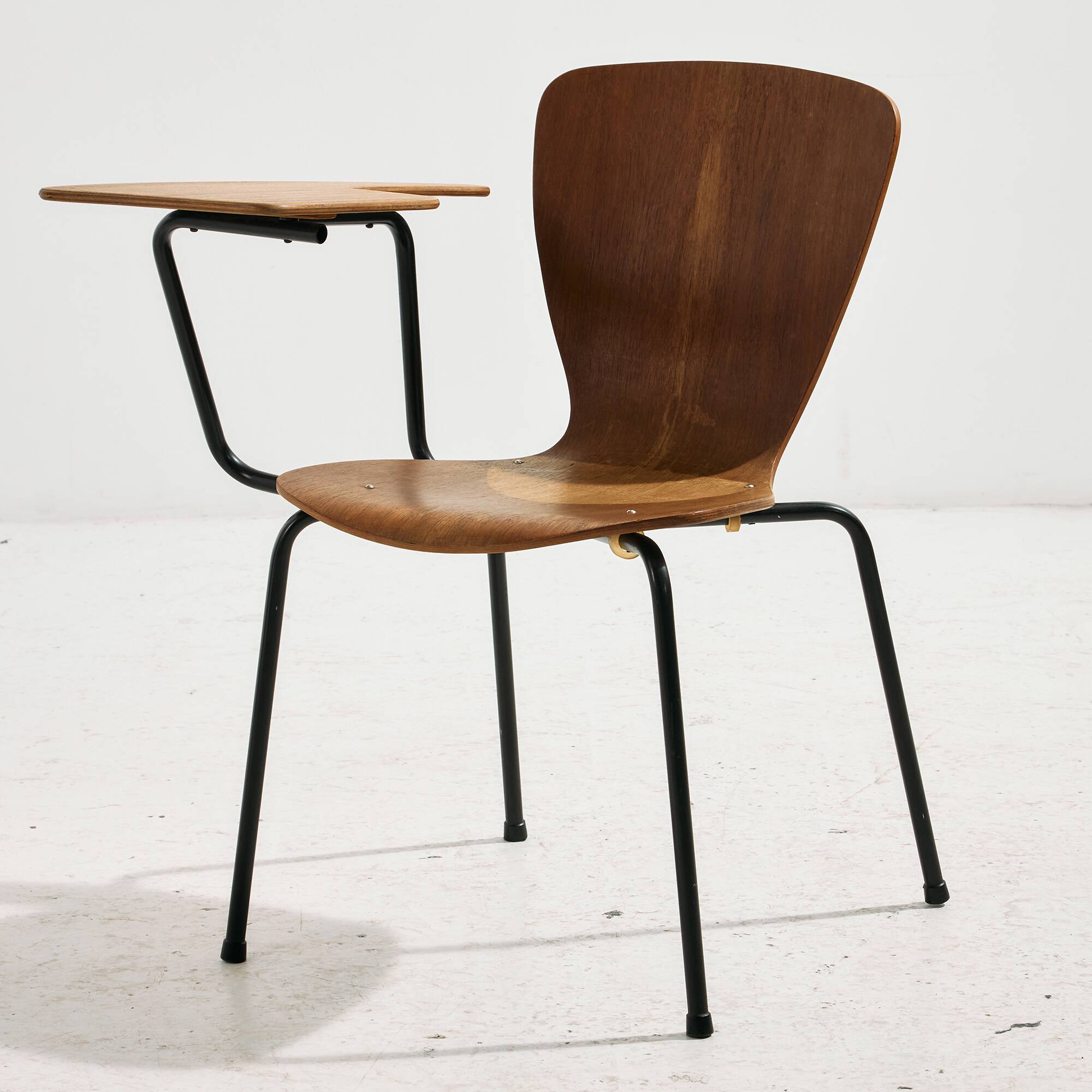 Teak chair with writing tablet