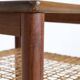 Rare set of three teak nesting tables with cane magazine rack / side tables / mid-century Danish modern design / 1950s / 1960s