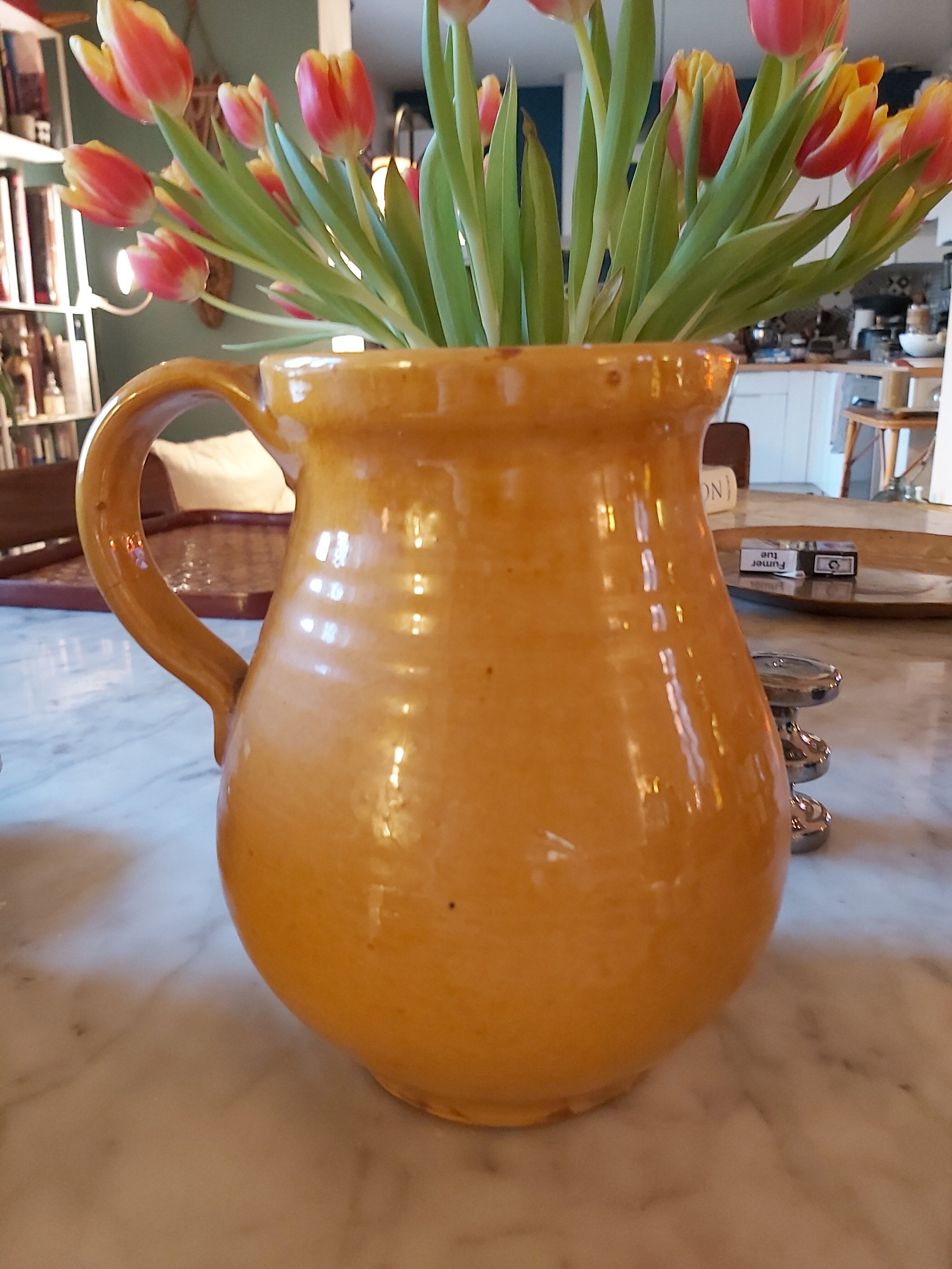 Vintage enamelled ceramic pitcher