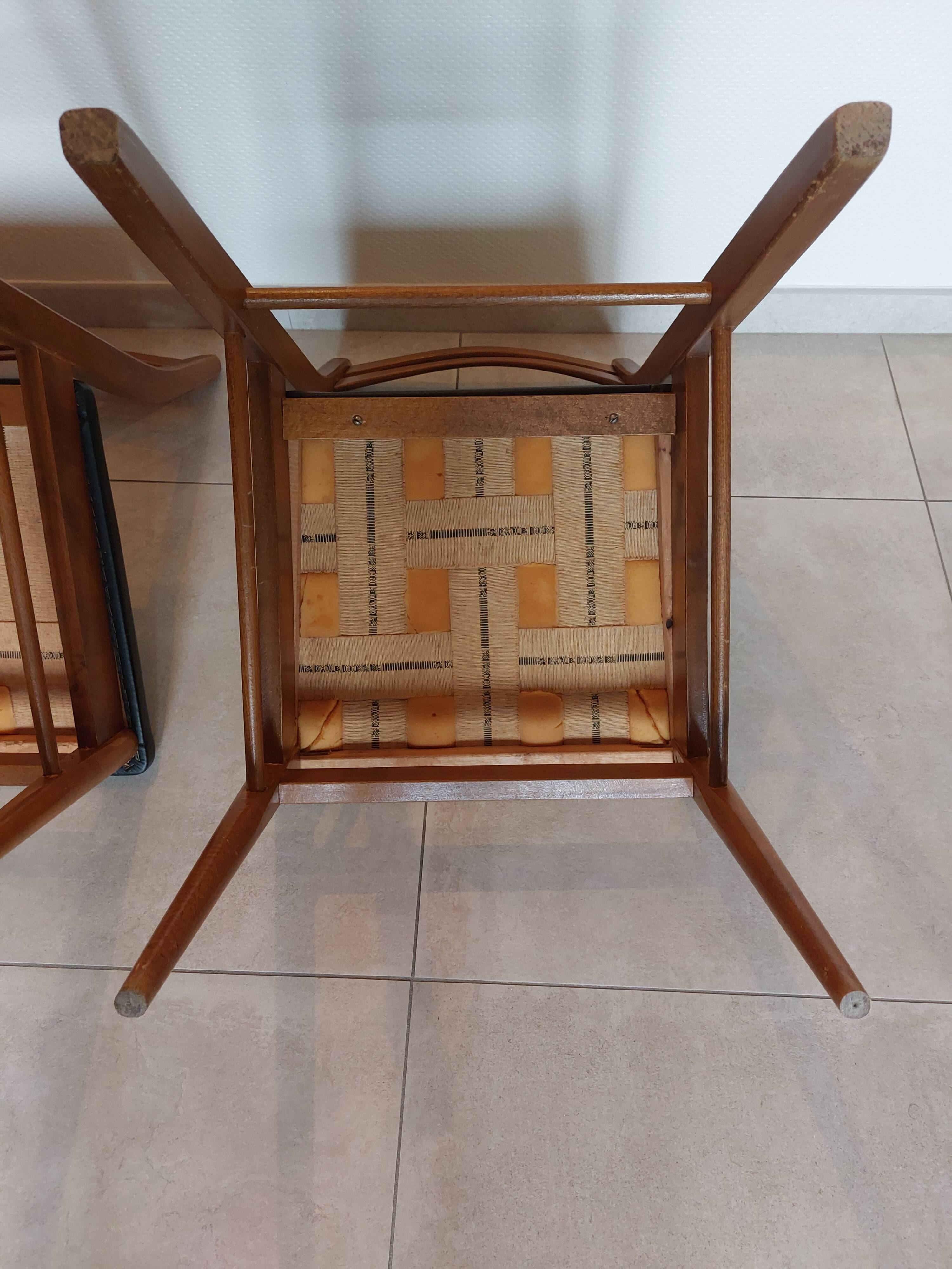 5 Scandinavian style chairs, wood and black faux leather.